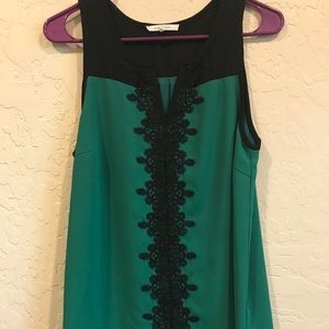 Green and black blouse